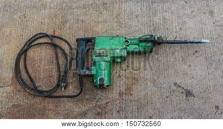 Electric hammer Plugger. on the cement floor