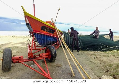 Labuan, Malaysia - Oct 6, 2016: The life of fishermen along the Pohon Batu beach, Labuan island, Malaysia on 6th Oct 2016. They live mainly on fishing along the coast.