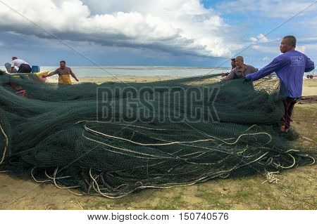 Labuan, Malaysia - Oct 6, 2016: The life of fishermen along the Pohon Batu beach, Labuan island, Malaysia on 6th Oct 2016. They live mainly on fishing along the coast.