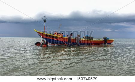 Labuan, Malaysia - Oct 6, 2016: The life of fishermen along the Pohon Batu beach, Labuan island, Malaysia on 6th Oct 2016. They live mainly on fishing along the coast.