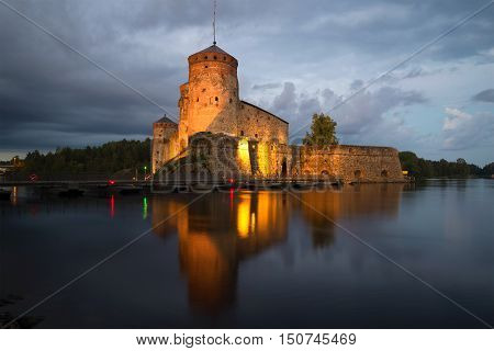 The medieval fortess in Savonlinna in the summer twilight. Finland