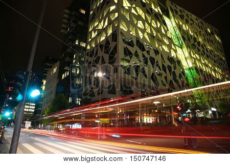 moving car with blur light through Dronning Eufemias gate street in Oslo at night