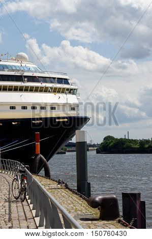 HAMBURG, GERMANY - JULY 18, 2015: the front part of cruise liner moored in the seaport. Closeup.