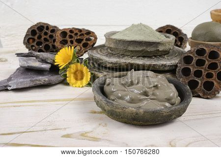 Ancient minerals - black green and blue clay powder and mud mask for spa beauty concept