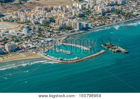 Sea port city of Larnaca, Cyprus.  This picture was taken through the window of the plane.