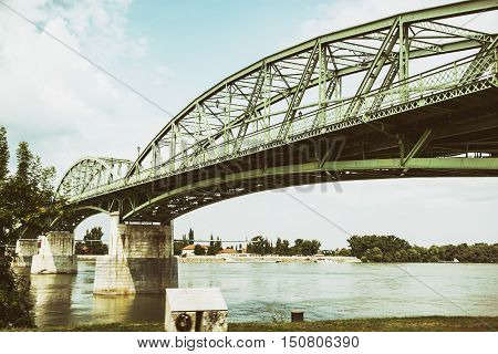 Maria Valeria bridge joins Esztergom in Hungary and Sturovo in Slovak republic across the Danube river. Transportation theme. Architectural scene.