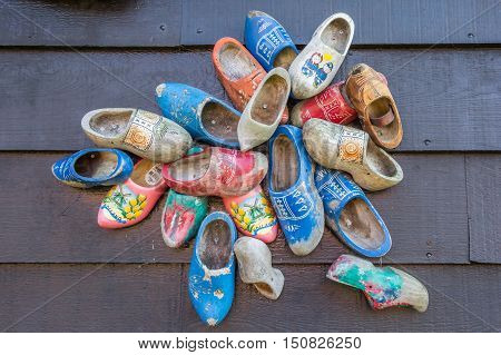 ZAANSE SCHANS, NETHERLANDS - SEPTEMBER 13, 2016: Decorated dutch wooden shoes in Zaanse Schans, Netherlands