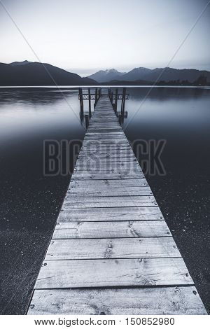 An old pier was captured in portrait format.