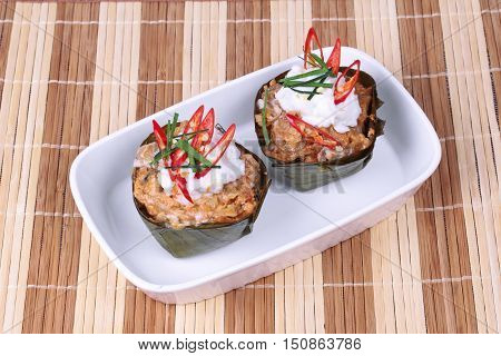 Streamed vegetable curry in banana leaf cup call 