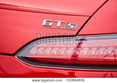 Kiev, Ukraine - OCTOBER 4, 2016: Mercedes Benz star experience. The interesting series of test drives. The logo GTs and the tail light closeup.