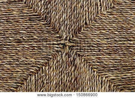 Background Pattern Brown Square Handicraft Weave Texture Wicker Surface for Furniture Material.