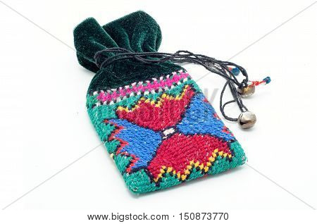 Embroidered patterns small pouch on a white background. Sufi bells.