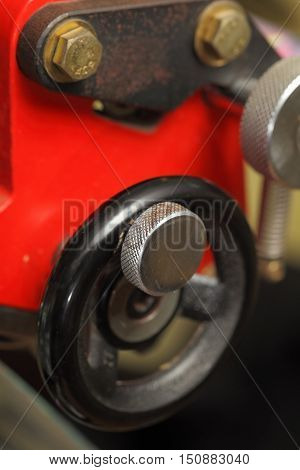 Coupling twist handle of machinery. Macro photo