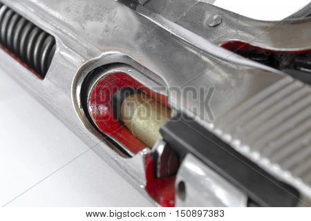 Pistol and ammunition on the white background.