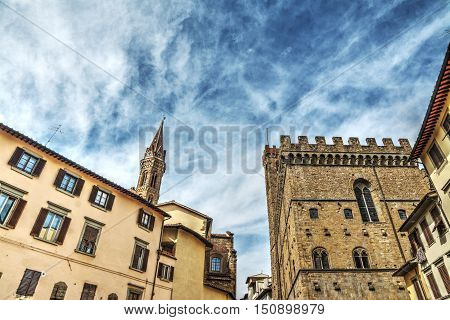Badia Fiorentina steeple and Museo del Bargello in Florence Italy