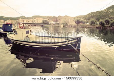 a boat moored in Temo river Sardinia