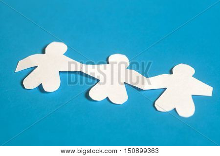 White paper symbol people on blue background