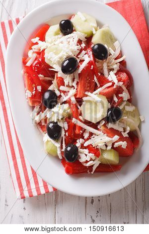 Shopska Salad From Fresh Vegetables With Feta Cheese Close-up. Vertical Top View