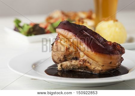 frankonian schaeufele roasted pork portion with beer