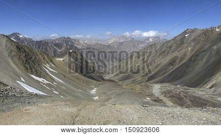 Stone valley over the glacier in the upper reaches of the Creek Shavoursoy. The Western Tien-Shan. Uzbekistan