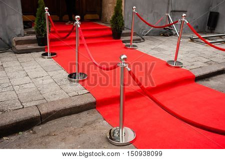 Red Carpet -  is traditionally used to mark the route taken by heads of state on ceremonial and formal occasions