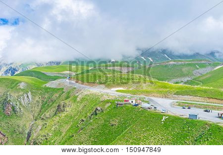 The Cross Pass over the Greater Caucasus Mountain Range is 2379 m the peaks are often hidden in clouds Gudauri Georgia.