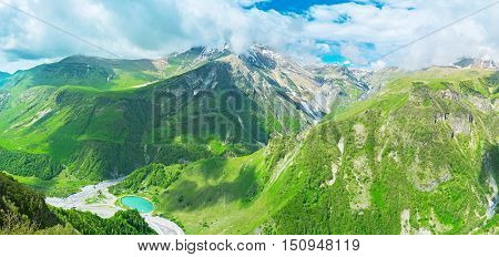 The Cross Pass is the perfect viewpoint overlooking the peaks of Greater Caucasus Mountain Range Gudauri Georgia.