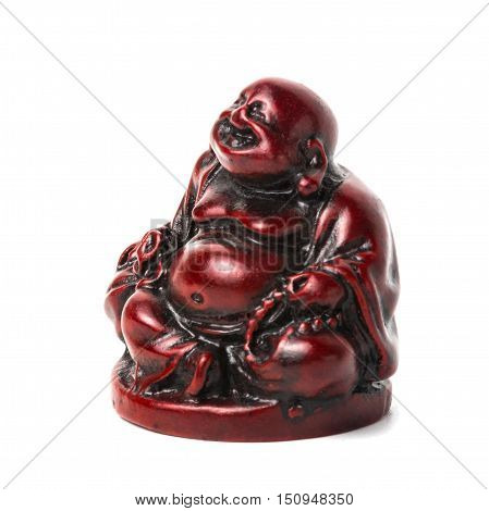 Netsuke happy fat man with a bag and a rosary. Isolated. A miniature sculpture which was used as a button-like trinket in traditional Japanese clothes kimono kosode which was devoid of pockets.