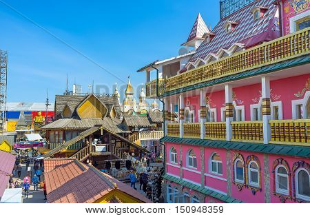MOSCOW RUSSIA - MAY 10 2015: The carved timbered and colorful painted mansions in Izmailovsky Market represent the different periods of architecture in Russia on May 10 in Moscow.