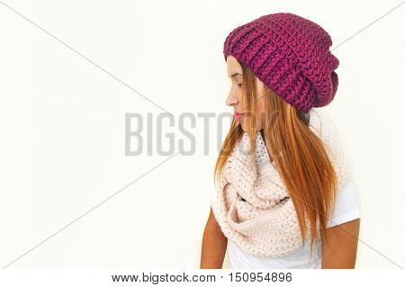 greek model advertises crochet scarf and beanie