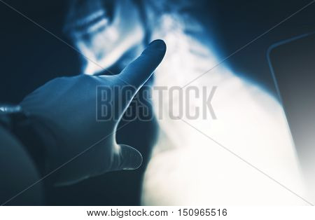 Xray Scan Examination. Doctor Hand in Safety Gloves Exposing the Problem.