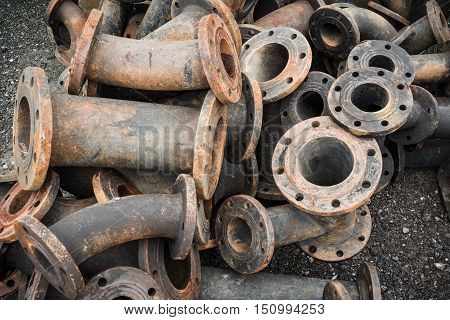 Storage of sewage pipe fittings Cast iron pipe fittings.