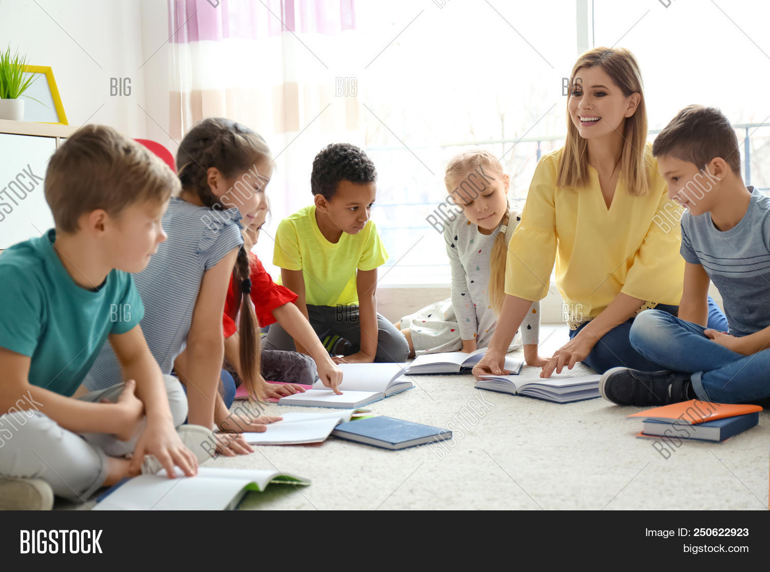 Female Teacher Helping Image & Photo (Free Trial) | Bigstock