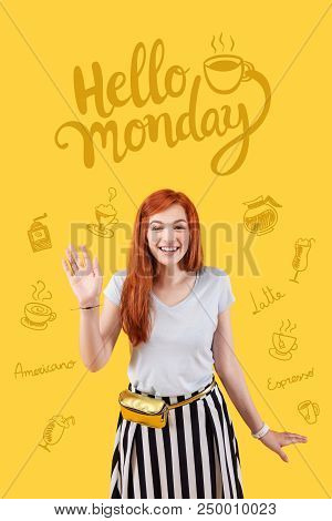 Hello Monday. Positive Young Waitress Loving Her Job And Smiling While Greeting Monday In The Mornin