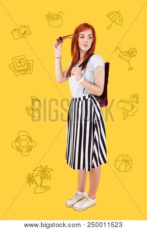 Interesting Adventure. Pretty Young Girl Standing With Sunglasses In Her Hand And Having A Backpack 