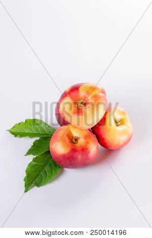 New Hybrid Sweet Fruit Nectarina Platerina, Flat Saturn Or Donut Nectarine Peaches Close Up