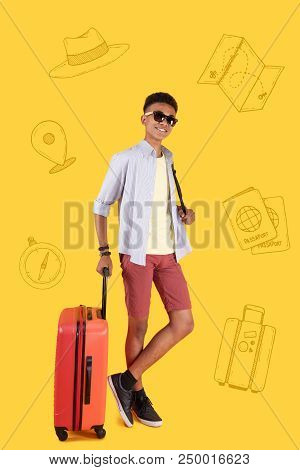 Going To Airport. Experienced Tourist Being On The Way To The Airport And Smiling While Carrying A B