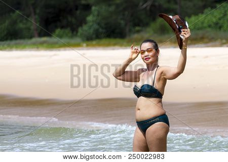 Woman Body Pretty With Bikini Hat And Wave On Beach At Bang Beot Beach, Chumphon Province Thailand