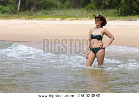 Woman Big Shape With Red Bikini Relax Wave On Beach At Bang Boet Beach, Chumphon Province Thailand