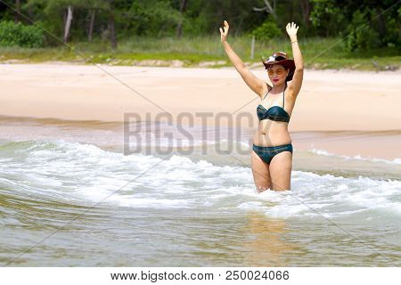 Woman Show Body Sexy With Bikini Hat And Wave On Beach At Bang Beot Beach, Chumphon Province Thailan