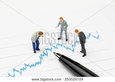 Financial Analysis, Investment Consultant Or Advisor Concept, Miniature Professional Businessmen Sta