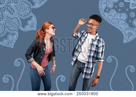 Dancing Together. Cheerful Friendly Students Wearing Casual Clothes And Dancing While Being At The G