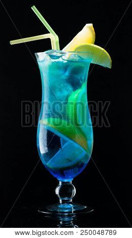 Cocktail Blue Lagune On Dark Background Close-up On The Bar