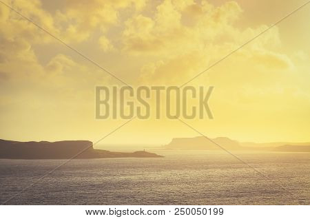 Ocean Coastline With Misty Golden Clouds, Scottish Highlands, Uk