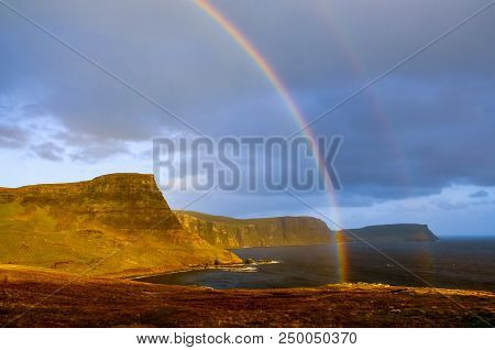 Rainbow Over A Dramatic Coastline Of Scottish Highlands, Isle Of Skye, Uk