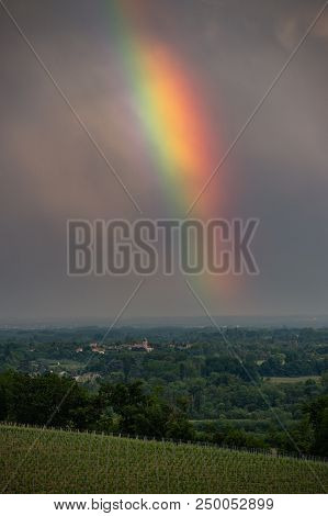 Colorful Rainbow And Storm In The Sky Above Bordeaux Vineyard