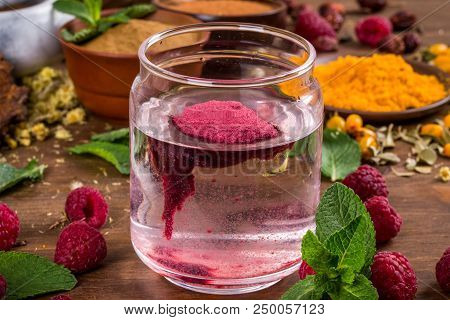 Raspberry Extract Stir In The Water Shot Close-up