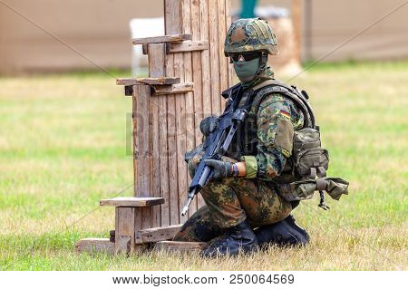 German Soldier With A Rifle On A Training Course