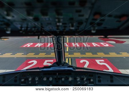Commercial airliner airplane flight cockpit during takeoff - holding position waiting for clearance