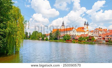 Telc Panorama. Water Reflection Of Houses And Telc Castle, Czech Republic. Unesco World Heritage Sit